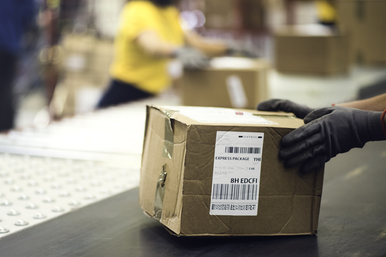 Person handling package 