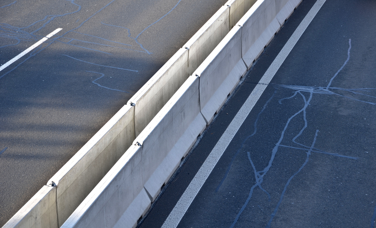 Jersey barrier separating traffic 